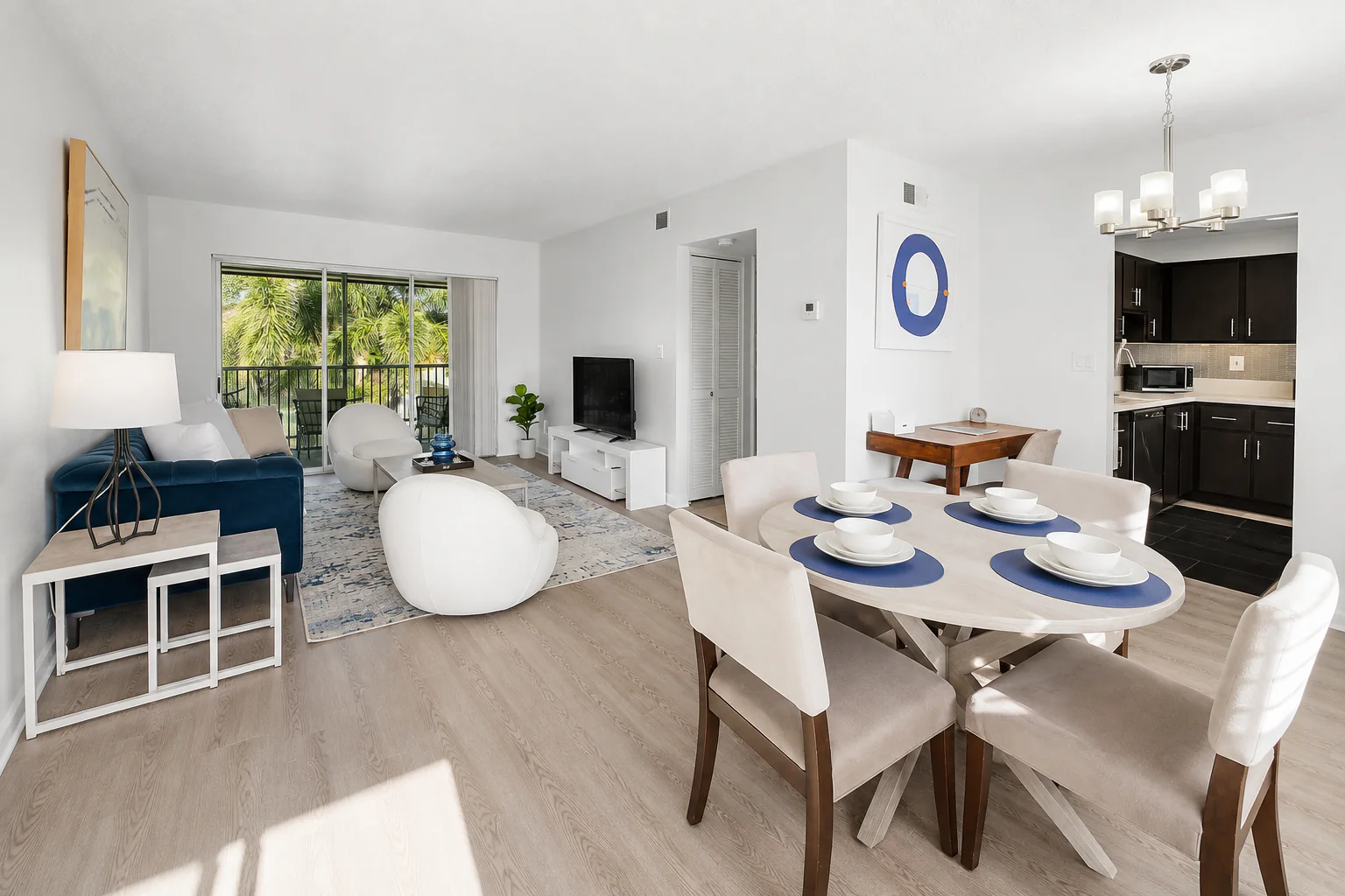 Open-plan Boca STR living and dining space beside the kitchen