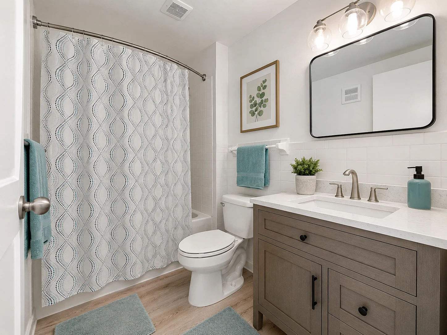 Full Boca STR bathroom with tub, vanity, and fresh towels