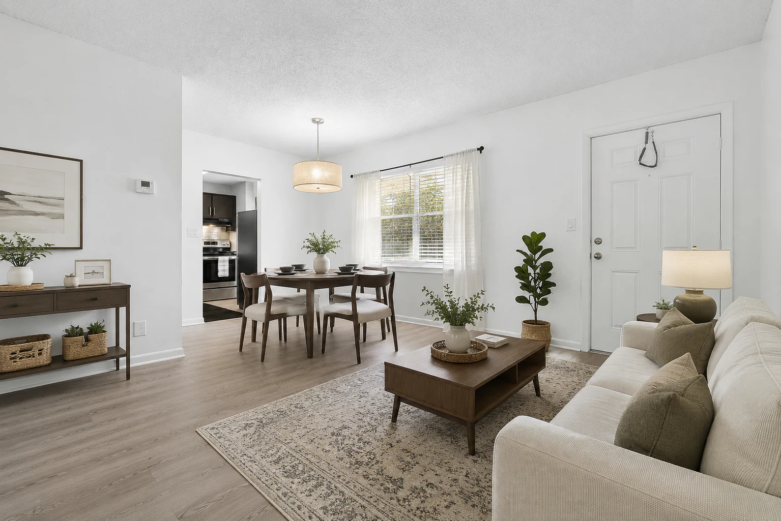 Boca STR living and dining space beside the entry door